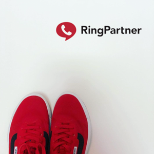 Team members receive a pair of red shoes each year on their workiversary.