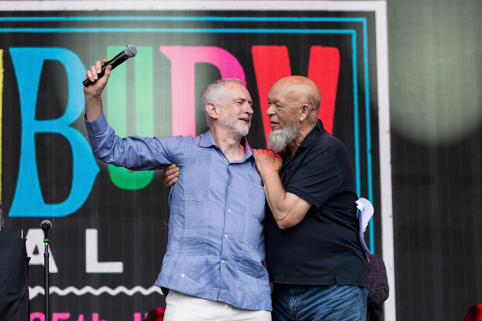 <p>Labour leader Jeremy Corbyn, left, and organizer Michael Eavis onstage at the Glastonbury Festival at Worthy Farm, in Somerset, England, Saturday, June 24, 2017. (Photo: Grant Pollard/Invision/AP) </p>