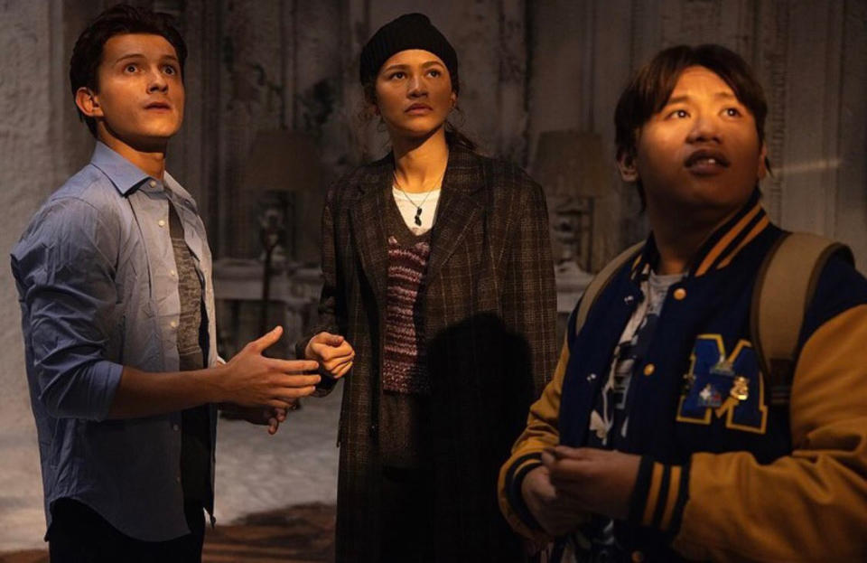 Peter Parker, MJ, and Ned Leeds in a room with light on their faces