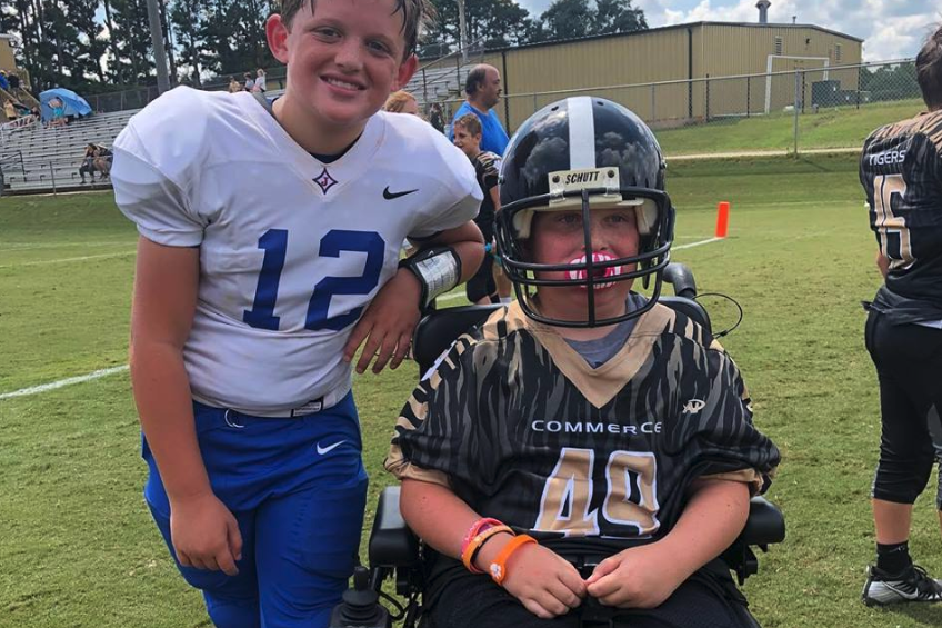 Hayes Hutto, right, scored his first touchdown, playing against his cousin, Britton. (Photo: Jodi Stephenson Hutto via Facebook)