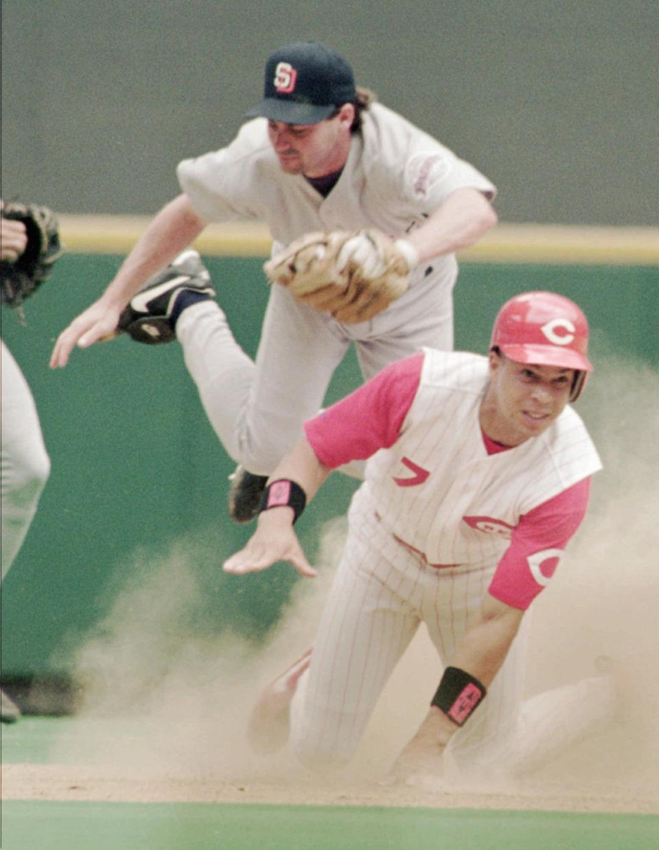 Cincinnati Reds' Darren Lewis (7) is tagged out by San Deigo Padres second baseman Jody Reed after Lewis attempted to steal second in the fifth inning Tuesday afternoon, July 25, 1995 in Cincinnati. (AP Photo/David Kohl)