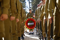 <p>Israel soldiers with wreaths during the funeral of Shimon Peres at Mount Herzl Cemetery on September 30, 2016 in Jerusalem, Israel. (Abir Sultan- Pool/Getty Images) </p>