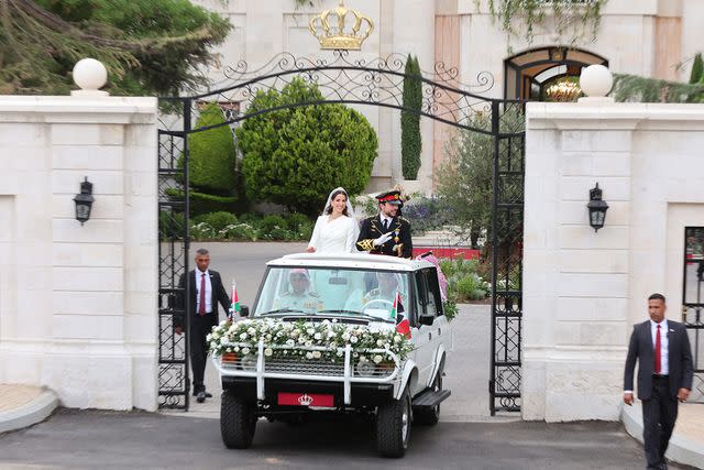 <p>KHALIL MAZRAAWI/AFP via Getty Images</p> Crown Prince Hussein and Princess Rajwa