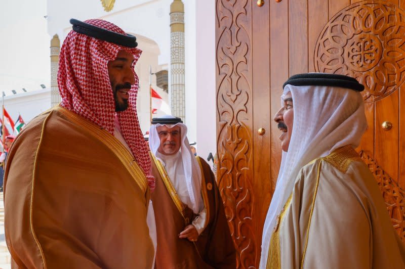 Bahrain's King Hamad bin Isa Al Khalifa, right, receives Saudi Arabia's Crown Prince Mohammed bin Salman in Manama in Bahrain on Thursday ahead of the 33rd Arab League. Photo by Bahrain News Agency/UPI