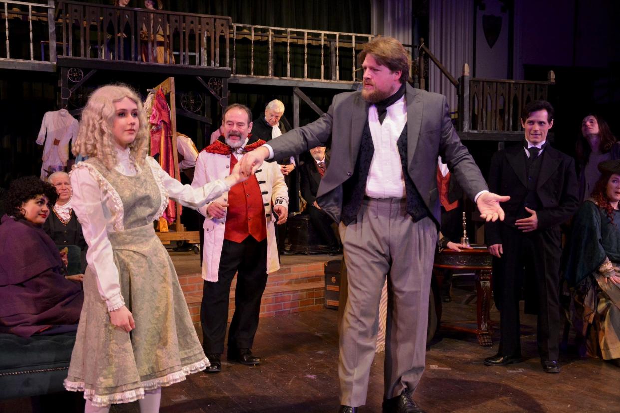 Among his numerous roles, Derrick Winger, front right, plays Folair, a member of an acting company, in "The Life and Acventures of Nicholas Nickleby" at Ohio Shakespeare Festival in Akron.