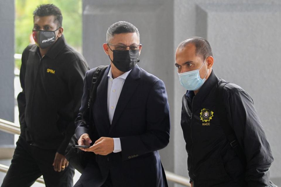 Former 1MDB chief executive officer Mohd Hazem Abdul Rahman arrives at the Kuala Lumpur High Court May 17, 2021. — Picture by Miera Zulyana