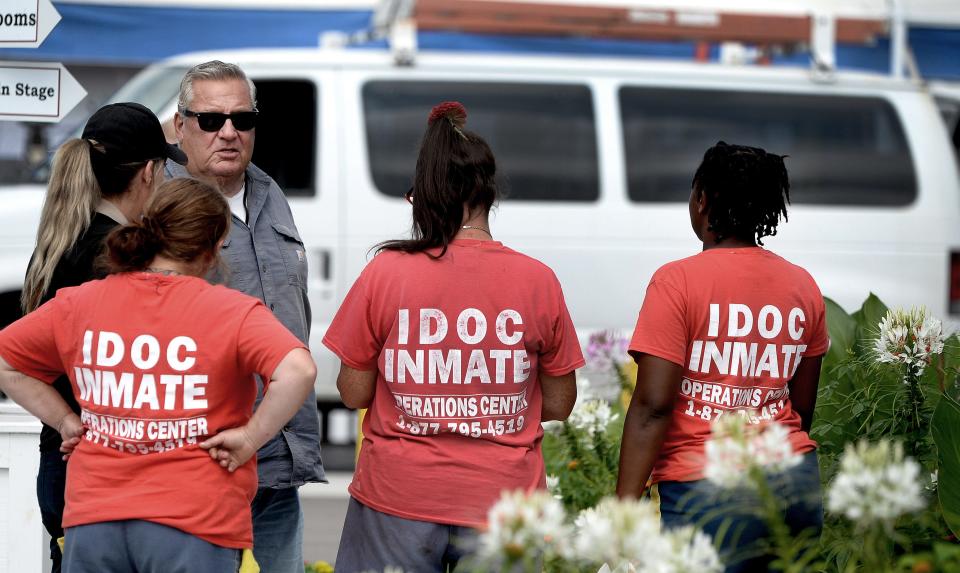 Illinois Department of Corrections inmates hold a variety of jobs, including beautification efforts at the Illinois State Fair as seen on Thursday, Aug. 10, 2023.
