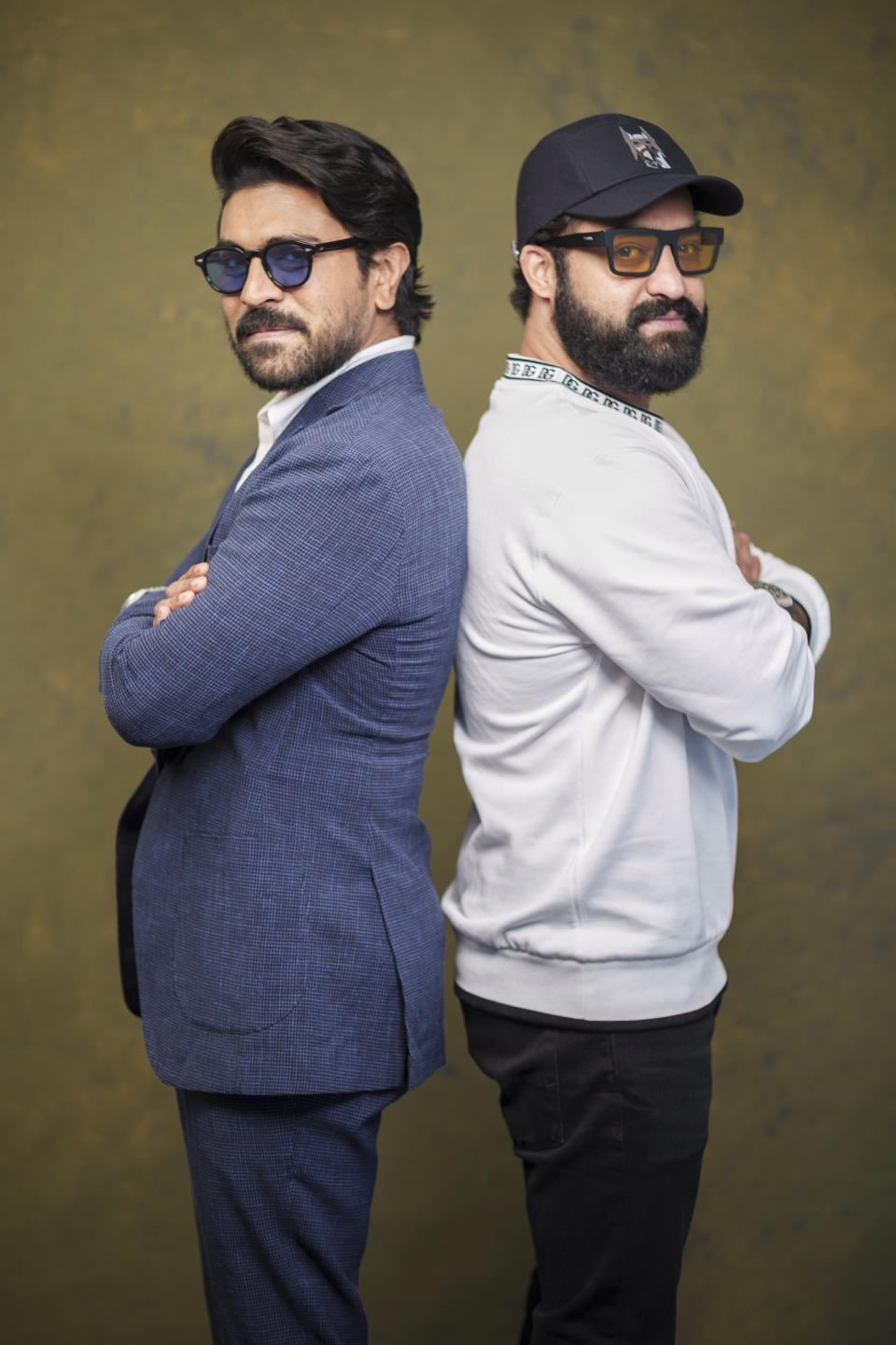 Indian actors, Ram Charan, left, and N. T. Rama Rao Jr., pose for a photo to promote their film "RRR" on Monday, Jan. 9, 2023, in Los Angeles. (AP Photo/Damian Dovarganes)