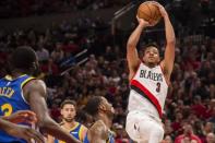 May 20, 2019; Portland, OR, USA; Portland Trail Blazers guard CJ McCollum (3) shoots a basket against Golden State Warriors forward Alfonzo McKinnie (28) during the first half in game four of the Western conference finals of the 2019 NBA Playoffs at Moda Center. Mandatory Credit: Troy Wayrynen-USA TODAY Sports