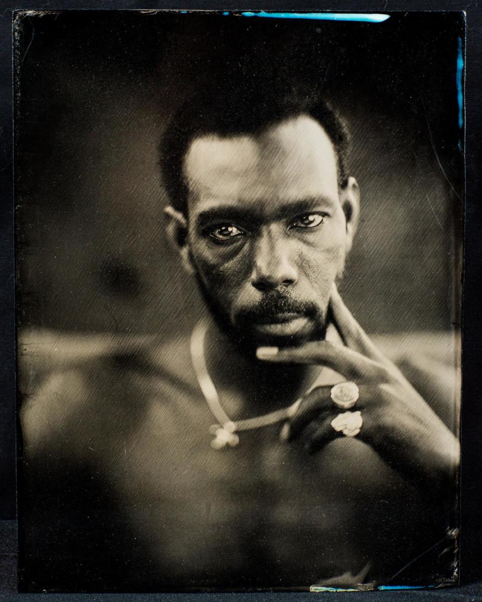 This undated photo provided by Matt Alberts shows Walter Lacey, a lifelong skateboarder in Denver in an image made by photographer, Matt Alberts. Wet plate collodion photography, invented in 1851, has experienced a resurge in recent years as photographers turn to this antiquated method for its moody, haunting images and complicated, hands-on process. "I’m creating something just with light and my hands," says Alberts. "It feels more like art." (AP Photo/Matt Alberts, Matt Alberts Photography)