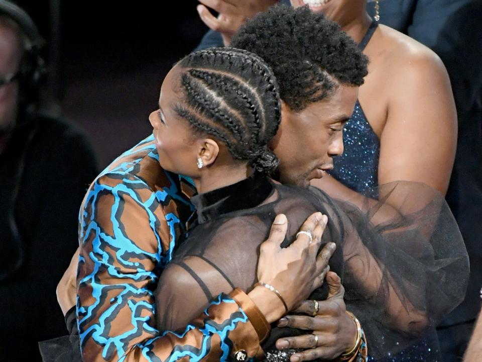 Chadwick Boseman hugs Letitia Wright at the 50th NAACP Image Awards at Dolby Theatre on March 30, 2019 in Hollywood, California.