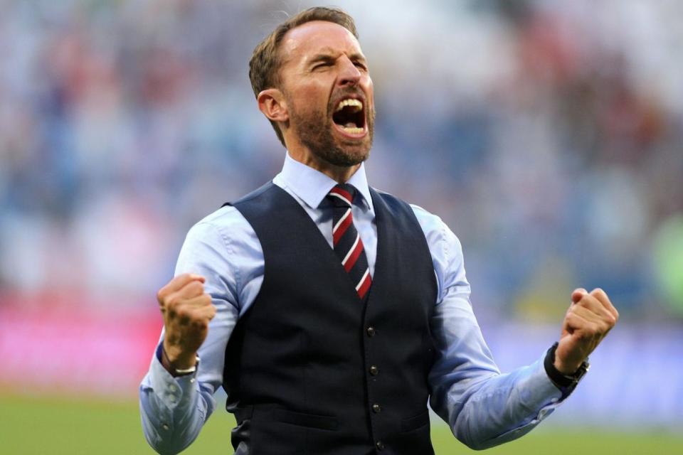 Get your waistcoat: England manager Gareth Southgate celebrating on Saturday (PA)