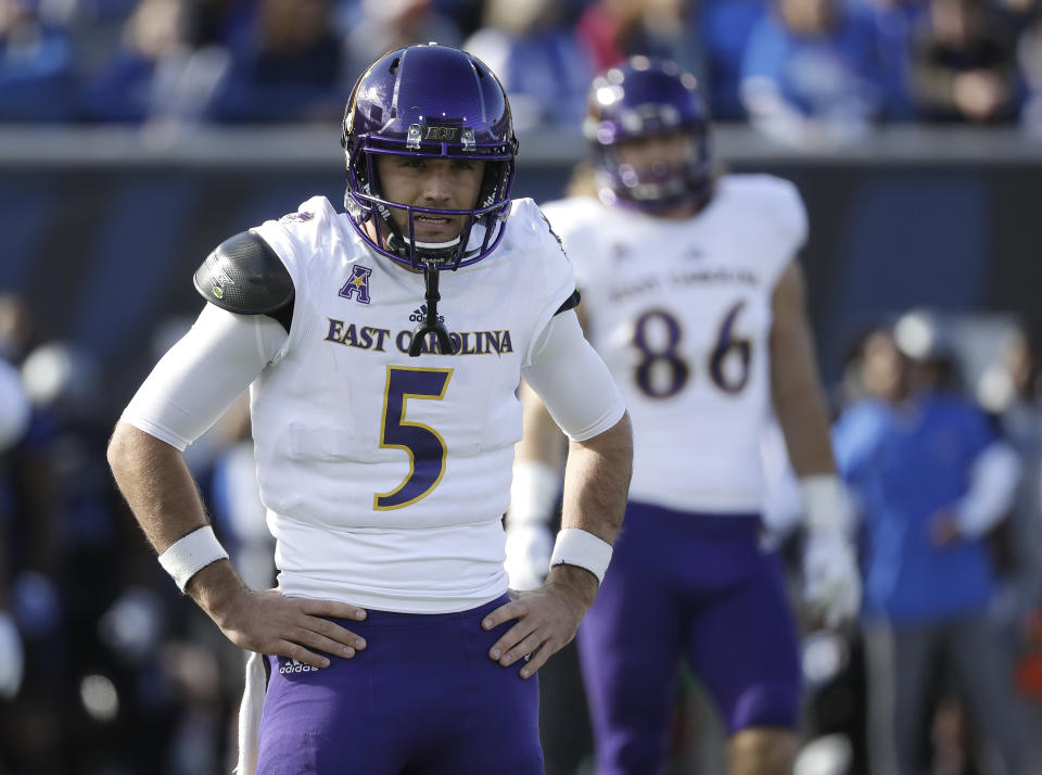 East Carolina quarterback Gardner Minshew (5) looks to the sideline for a play in the first half of an NCAA college football game against Memphis, Saturday, Nov. 25, 2017, in Memphis, Tenn. (AP Photo/Mark Humphrey)