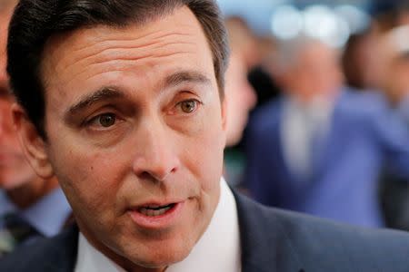 President and CEO of Ford Motor Company Mark Fields speaks with reporters during the media preview of the 2016 New York International Auto Show in Manhattan, New York March 23, 2016. REUTERS/Eduardo Munoz - RTSBY7L