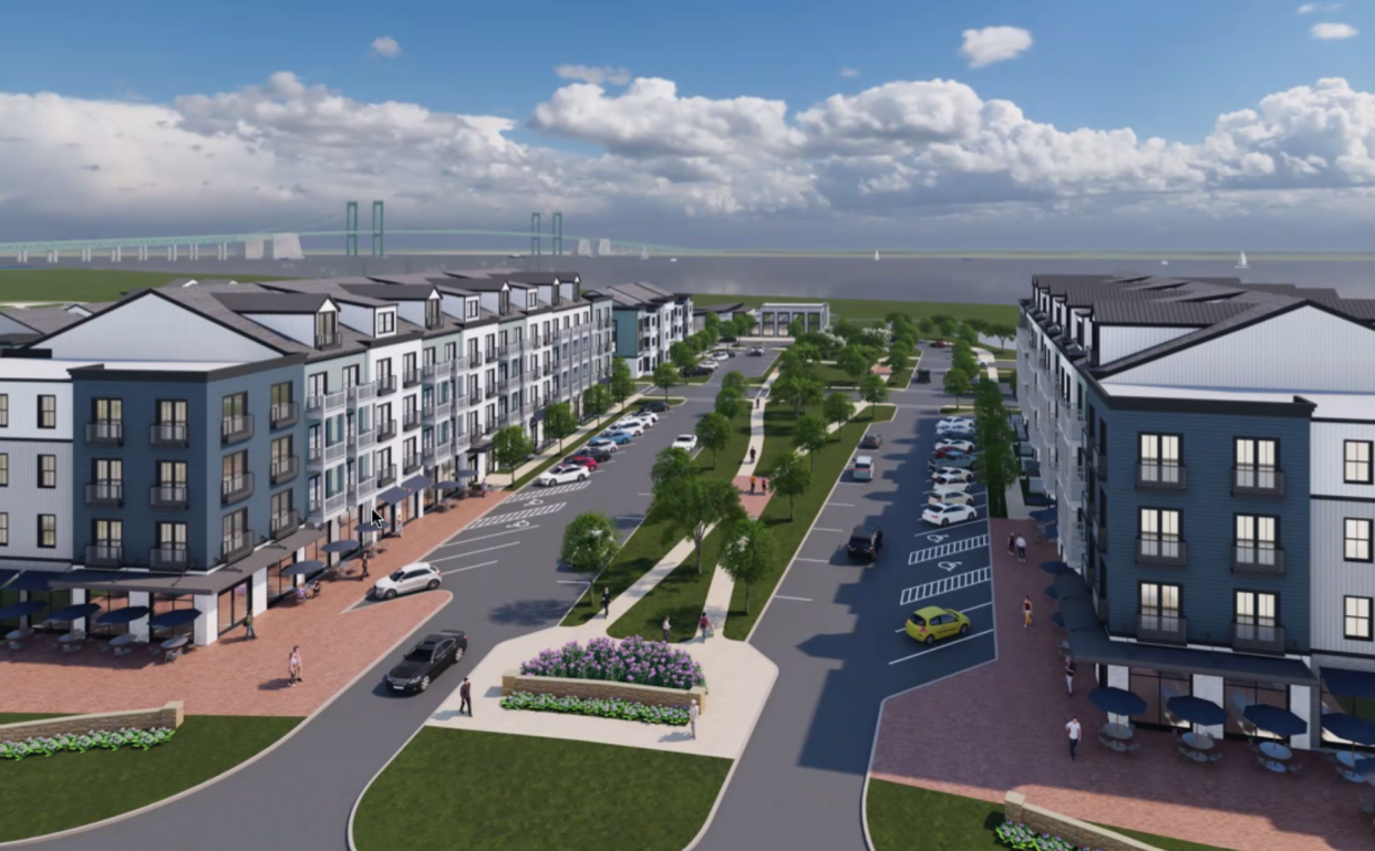 A rendering of the Flats at Riveredge project in New Castle along the Delaware River. The Delaware Memorial Bridge would be in view of the housing development, which would consist of apartments, single-family homes, twin homes and town homes.