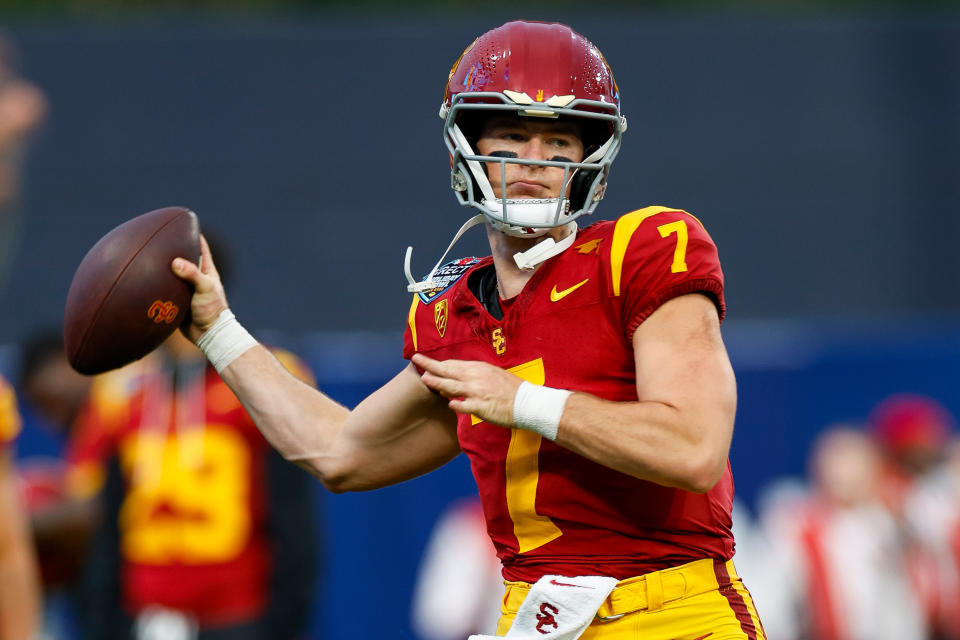 SAN DIEGO, CALIFORNIA - DECEMBER 27: Miller Moss #7 of the USC Trojans warms up prior to the DIRECTV Holiday Bowl game against the Louisville Cardinals at Petco Park on December 27, 2023 in San Diego, California. (Photo by Brandon Sloter/Getty Images)