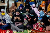 Filipino Muslims pray along the street outside the mosque during Eid'l Adha on July 31, 2020 in Manila, Philippines.(Photo by Lisa Marie David/NurPhoto via Getty Images)