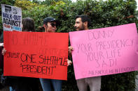 <p>Protesters gather with signs outside Winfield House, the London residence of US ambassador Woody Johnson, where US President Donald Trump and First Lady Melania Trump are staying tonight on July 12, 2018 in London, Britain. (Photo: Jack Taylor/Getty Images) </p>