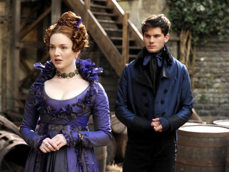 Jeremy Irvine as Pip with Grainger as Estella in ‘Great Expectations’