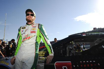 Dale Earnhardt Jr., waits to qualify for Sunday&#39;s NASCAR Sprint Cup Series auto race at Talladega Superspeedway Saturday, Oct. 18, 2014, in Talladega, Ala. (AP Photo/Rainier Ehrhardt)