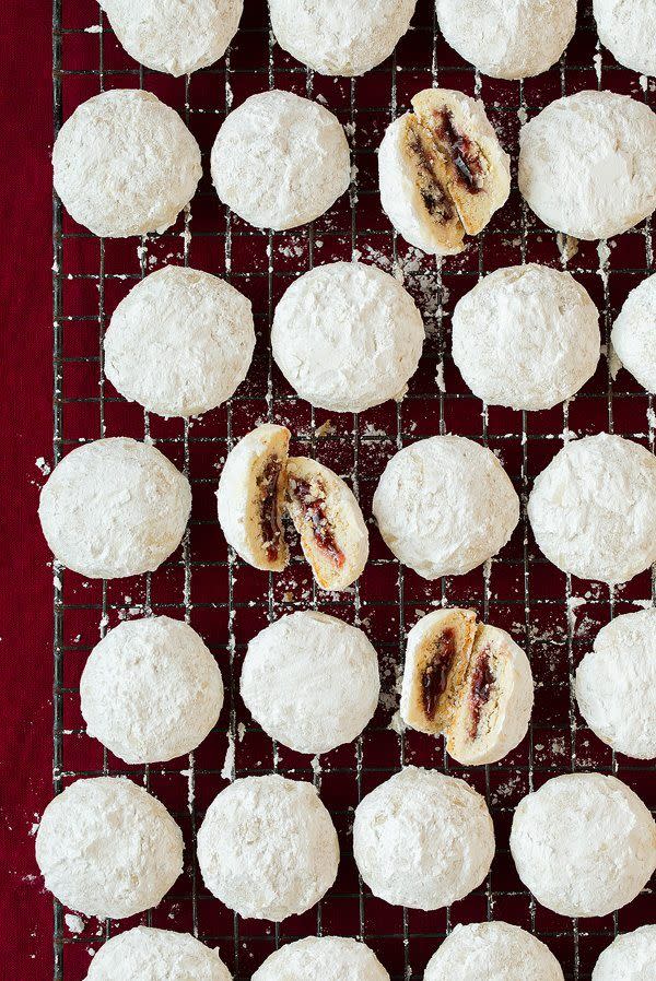 <p>Elevate your favorite snowball cookie with this recipe that uses tasty raspberry jam as a surprise in the middle.</p><p><strong>Get the recipe at <a href="https://www.cookingclassy.com/raspberry-almond-snowball-cookies/" rel="nofollow noopener" target="_blank" data-ylk="slk:Cooking Classy" class="link ">Cooking Classy</a>.</strong> </p>