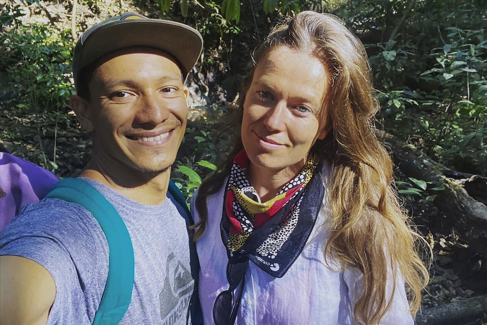 New Zealander Bergen Graham and her husband Oscar Acevedo take a selfie in Punta Mango, EL Salvador in January 2021. As part of its efforts to minimize the spread of the coronavirus, New Zealand requires all incoming travelers, vaccinated or not, to spend 14 days isolating in a hotel run by the military. Because demand is far outstripping supply, New Zealanders are being forced to put on hold their inalienable right to return home. (Oscar Acevedo via AP)