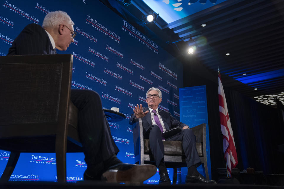 David Rubenstein, Chairman of the Economic Club of Washington, left, and Federal Reserve Chair Jerome Powell, right, speak at the Economic Club of Washington, Tuesday, Feb. 7, 2023, at the Renaissance Hotel in Washington. (AP Photo/Jess Rapfogel)