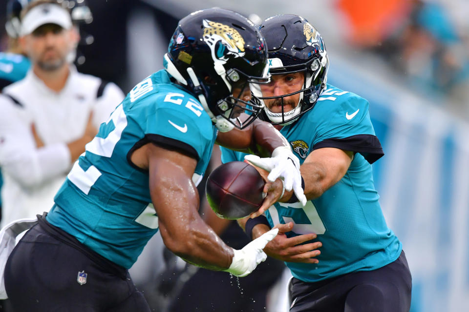 Jaguars teal and black uniforms