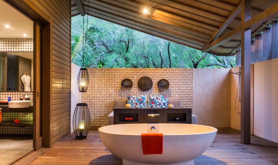 The adults-only, Zen Oasis section of Club Med Punta Cana is all about serenity, and its Deluxe Suites deliver that in the bathroom with outdoor tubs, showers and mood lighting.