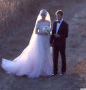 Anne Hathaway married Adam Shulman in a pink and white Valentino gown on September 2012. <br><a href="http://www.huffingtonpost.com/" rel="nofollow noopener" target="_blank" data-ylk="slk:Credit :Huffington Post;elm:context_link;itc:0;sec:content-canvas" class="link ">Credit :Huffington Post</a>
