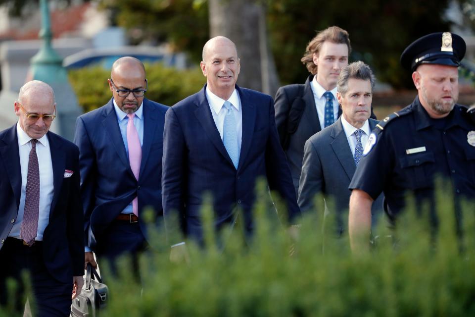 US Ambassador to the European Union Gordon Sondland, center, arrives for a joint interview with the House Committee on Foreign Affairs, House Permanent Select Committee on Intelligence, and House Committee on Oversight and Reform on Capitol Hill in Washington, Oct. 17, 2019.  Sondalnd told the House impeachment panel investigating President Donald Trump that he was disappointed that he had to consult with the president's personal lawyer Rudy Giuliani on Ukraine policy.