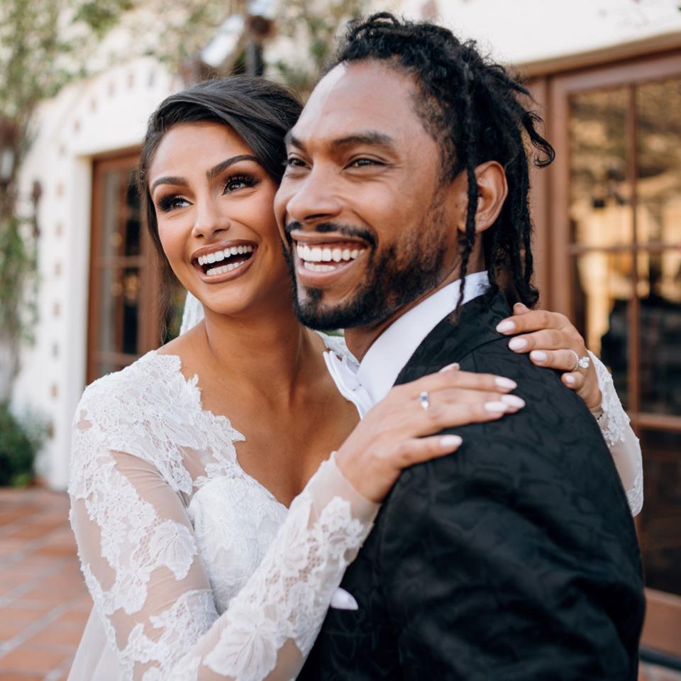 When Nazanin Mandi married Miguel at the Hummingbird Nest Ranch near Los Angeles, she wore a classic updo and a dramatic eyeliner.