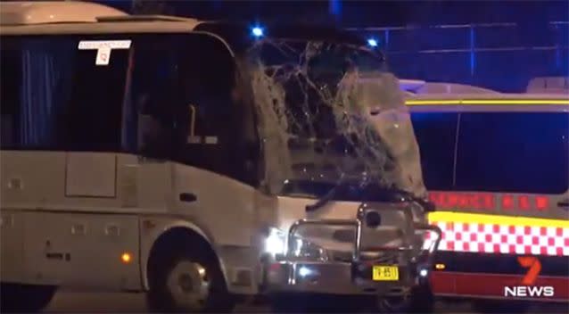 Pictured: The minibus that allegedly collided with both the stationary cars. Photo: 7 News