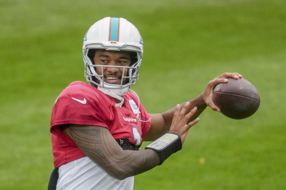 Miami Dolphins quarterback Tua Tagovailoa throws the ball during a practice session in Frankfurt, Germany, Thursday, Nov. 2, 2023. The Miami Dolphins are set to play the Kansas City Chiefs in an NFL game in Frankfurt on Sunday Nov. 5, 2023. (AP Photo/Michael Probst)