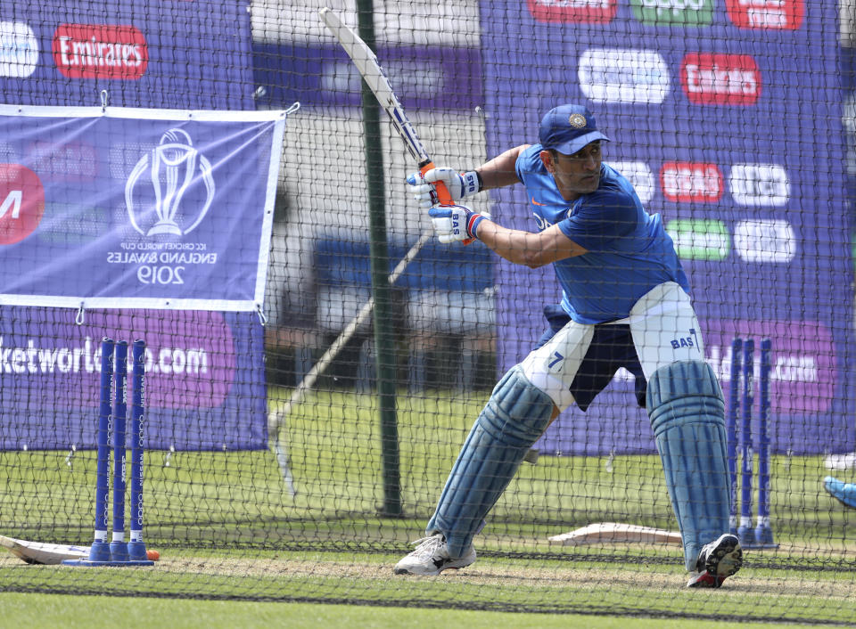 India's Mahendra Singh Dhoni bats in the nets during a training session at The Oval in London, Thursday, May 23, 2019. The Cricket World Cup starts on Thursday May 30. (AP Photo/Aijaz Rahi)