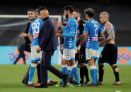 Soccer Football - Serie A - Napoli v Inter Milan - Stadio San Paolo, Naples, Italy - May 19, 2019 Inter Milan coach Luciano Spalletti looks dejected with Mauro Icardi and Radja Nainggolan after the match as Napoli and Inter Milan players shake hands REUTERS/Ciro De Luca