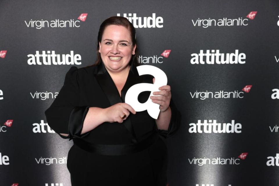 Jessica Gunning smiling while holding her Attitude Award