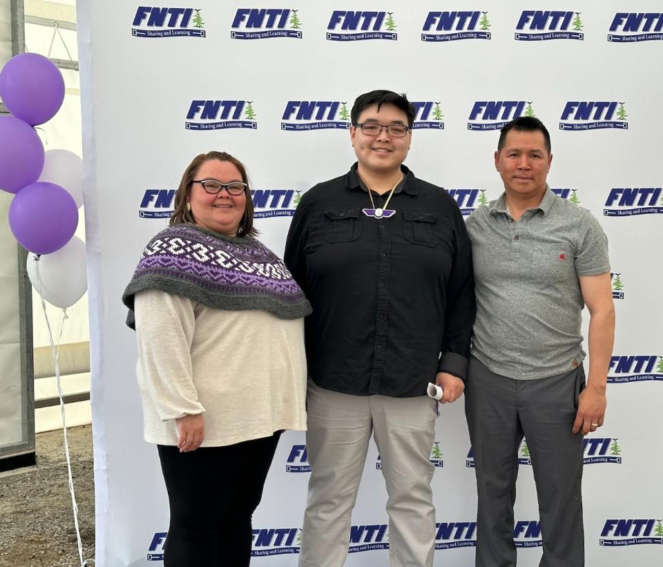 Joseph Akulukjuk (centre) completed flying school with support from his family, including his mom, Rosemary Nakashuk (left) and his step-dad, Josephie Nakashuk (right). 