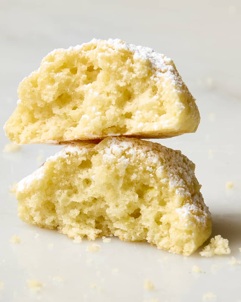 head on shot of a stack of lemon cloud cookies split in half.