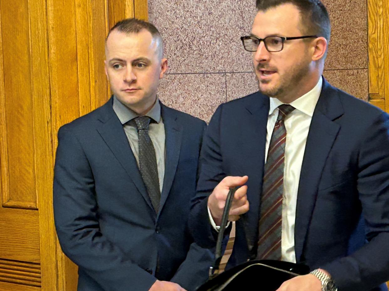 Former West Lafayette police Officer Jacob Forgey, left, and his attorney, Mason Riley, as they prepare to enter Tippecanoe Superior 4 on Friday, May 17, 2024, for Forgey's initial hearing. A special prosecutor charged Forgey with official misconduct and counterfeiting a search warrant.