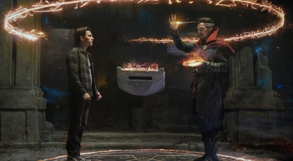Doctor Strange casting a time spell in front of Peter Parker