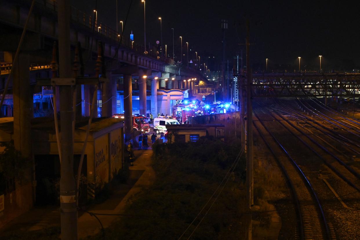 Rescuers work on the site of a bus accident on October 03, 2023 in Mestre, near Venice. (AFP via Getty Images)