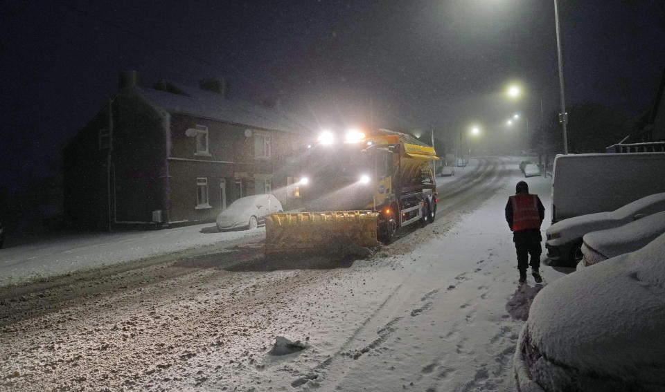 A snowplough clears a road in Tow Law, County Durham, as Storm Eunice sweeps across the UK after hitting the south coast earlier on Friday. With attractions closing, travel disruption and a major incident declared in some areas, people have been urged to stay indoors. Picture date: Friday February 18, 2022. (Photo by Owen Humphreys/PA Images via Getty Images)