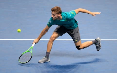 David Goffin in action against Grigor Dimitrov - Credit: PA