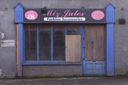 A derelict shop front is seen in Edenderry, Ireland February 18, 2016. REUTERS/Clodagh Kilcoyn