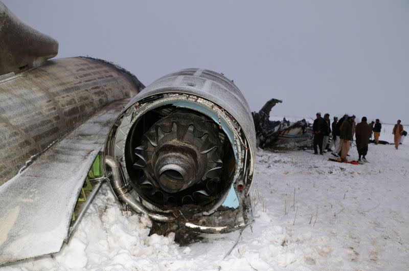 The wreckage of an airplane is seen after a crash in Deh Yak district of Ghazni province, Afghanistan