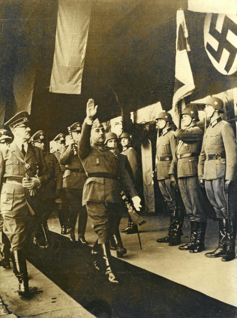 A meeting between Nazi leader Adolf Hitler and Spanish Gen. Francisco Franco in Basque Country, France, in 1940. <a href="https://media.gettyimages.com/id/1083751790/photo/spain.jpg?s=612x612&w=gi&k=20&c=np-CIi9o33ttHtZmIQj1WSzOkdQqIRlNI7JZsGtP3YE=" rel="nofollow noopener" target="_blank" data-ylk="slk:adoc-photos/Getty Images;elm:context_link;itc:0;sec:content-canvas" class="link ">adoc-photos/Getty Images</a>