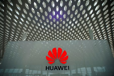 FILE PHOTO: A Huawei company logo at the Shenzhen International Airport