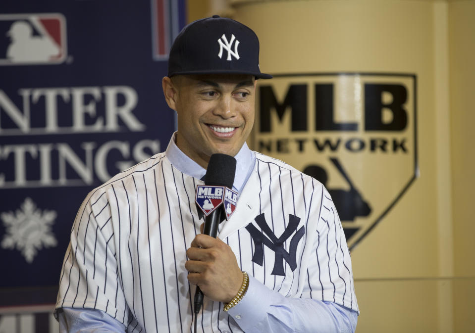 Giancarlo Stanton is all smiles, even if New York state tax is going to hit him hard. (AP Photo/Willie J. Allen Jr., File)