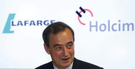 File photo of Lafarge CEO Bruno Lafont, who will become CEO of LafargeHolcim, addresses a news conference in Zurich April 7, 2014. REUTERS/Arnd Wiegmann